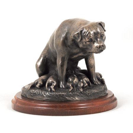 Rotweiler statue on wooden base
