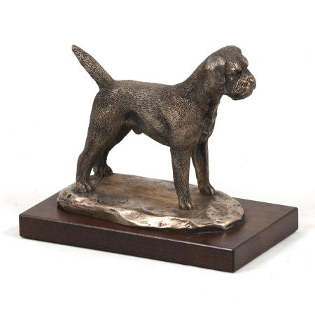 Border Terrier statue on wooden base